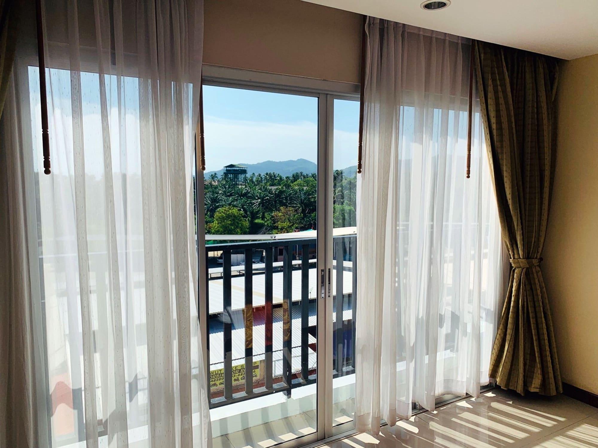Malin Patong Hotel Luaran gambar